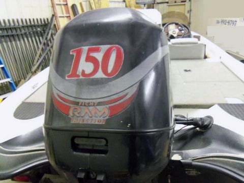 2000 Mercury Grand Marquis - Close-up of a boat motor with '150' and 'RAM Injection' branding visible.