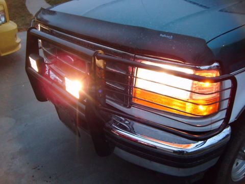 1996 Ford Bronco - Front view of a 1996 Ford Bronco, showing its grille, headlights, and a grille guard.