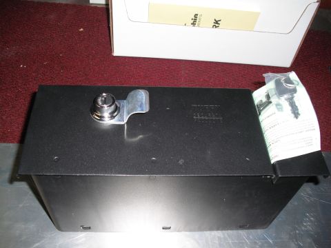 1968 Ford Bronco - A black metal lockbox with a cam lock and keys is shown, with some text visible on the packaging.