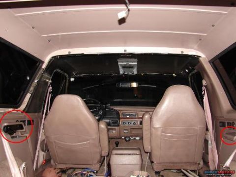 1993 Ford Bronco - The interior of a 1993 Ford Bronco is shown, with the front seats and dashboard visible.