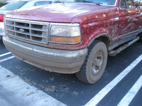 1995 Ford F-150 - This 1995 Ford F-150 is caked in mud after an offroading adventure.