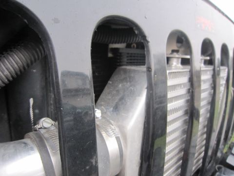 2008 Jeep Wrangler - Jeep Wrangler grille with an intercooler installed behind the radiator.