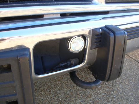 1997 Chevrolet Silverado 3500 - Platinum Burners from WM. I've since swapped them for the smaller rectangular ones. That's the block heater plug below.
