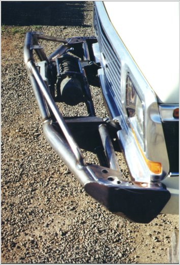 1979 Ford Bronco - Custom front bumper and winch assembly on a vehicle.