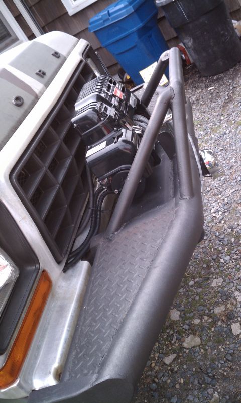 1979 Ford Bronco - Custom front bumper with winch and auxiliary lights installed on a truck.