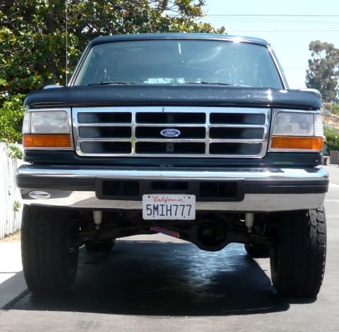 1995 Ford Bronco - Front view of a 1995 Ford Bronco, showing its grille and headlights.