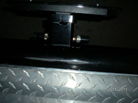 1996 Ford Bronco - A close-up view of a receiver hitch bracket and its fittings, with a date stamp of 12.11.2011 visible.