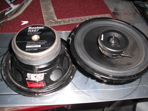 1968 Ford Bronco - Two Boston RX67 car speakers are shown, one with its label visible, on a workbench.