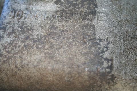 1982 Ford Bronco - Embossed text is visible on a metal component, likely part of a transmission assembly.