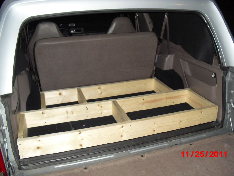Phase 2 of frame construction; this part will house the stereo amps and support the subwoofer. I wanted to keep it simple and skip trying to build radiused corners to go around the wheel wells because my carpentry skills aren't up to it