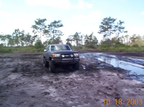 1995 Ford Bronco - This 1995 Ford Bronco navigates a muddy off-road course.