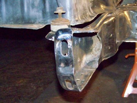 1985 Ford Bronco - This image shows a close-up of a vehicle's frame and a metal bracket, not a complete vehicle.