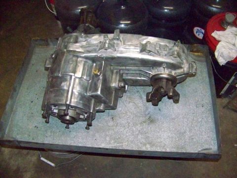 1985 Ford Bronco - This aluminum transfer case is shown on a metal table. The registry claims it is from a 1985 Ford Bronco.