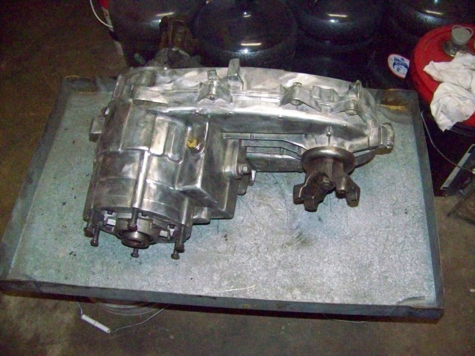 Aluminum transfer case with output shaft visible