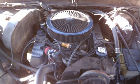 1979 Ford Bronco - View of an engine bay, likely from a V8 vehicle, with an aftermarket air filter assembly.