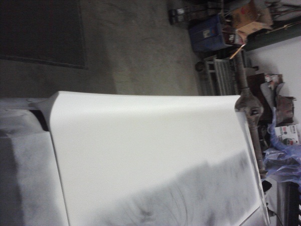 1966 Ford Mustang hood, white, undergoing body work