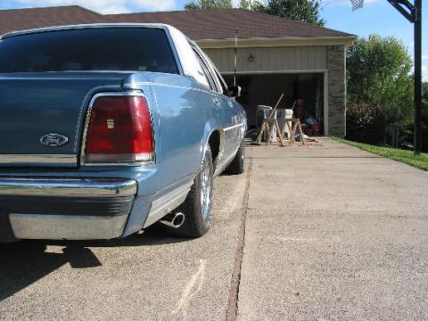 1988 Ford Crown Victoria - A rear angle shot... that is one oddly placed exhaust tip, isnt it?