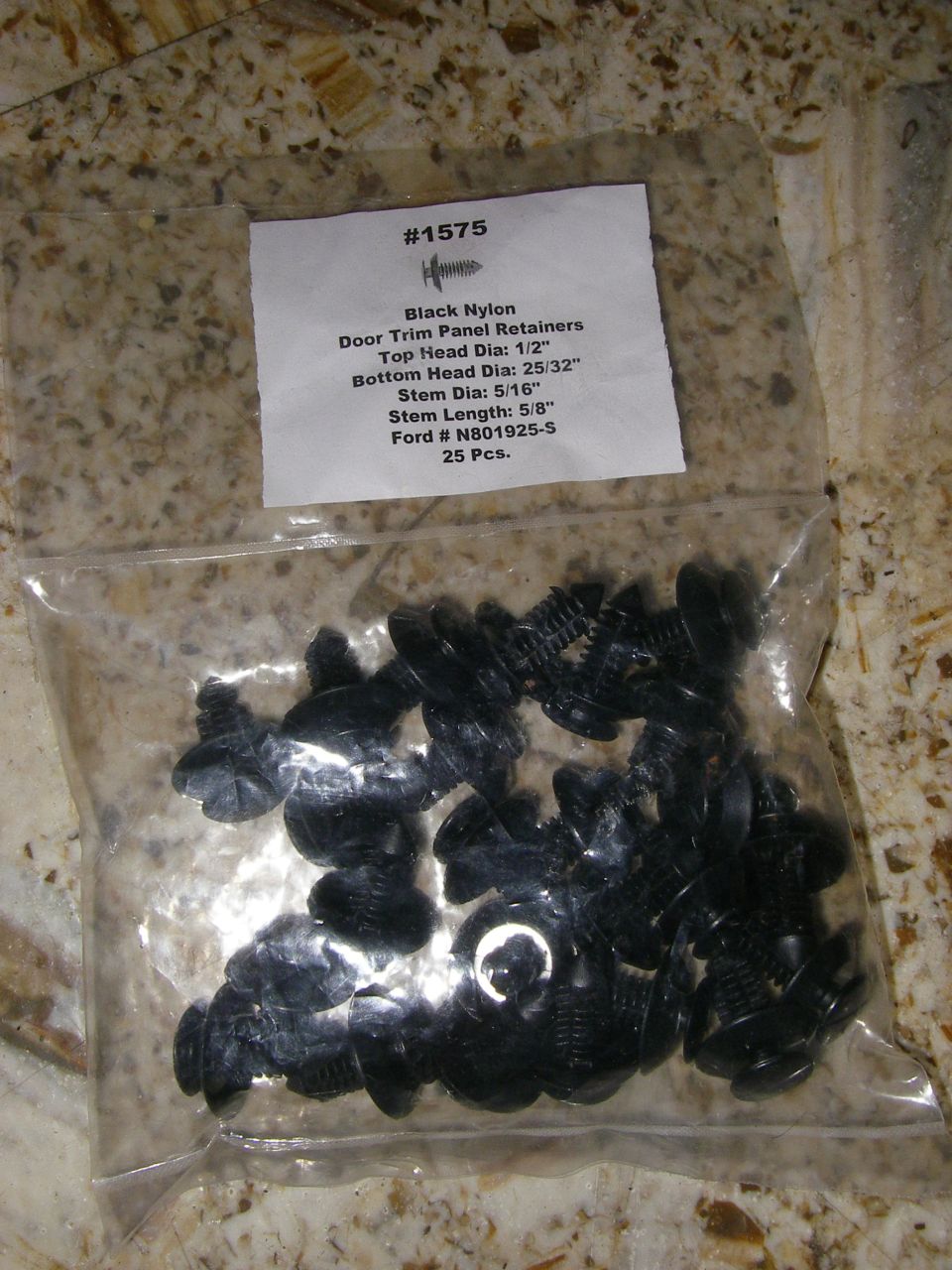 Bag of 25 black nylon door trim panel retainers with Ford part number N801925-S