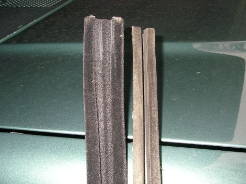 1990 Ford Bronco - Comparison of two different weatherstripping pieces, possibly for a vehicle door or window seal.