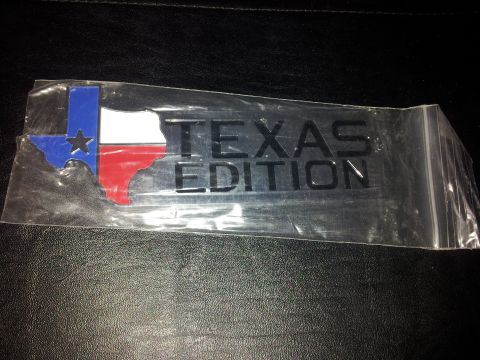 1979 Ford Bronco - Emblem reads 'Texas Edition' with the shape of Texas in its flag colors.