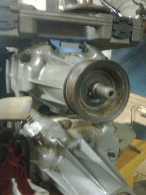 1984 Ford Bronco - Close-up of a supercharger assembly, likely for an engine upgrade or repair.
