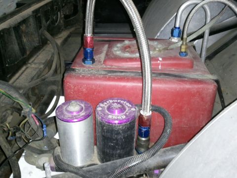 1967 Ford Mustang - Custom fuel cell and filter setup with braided lines.
