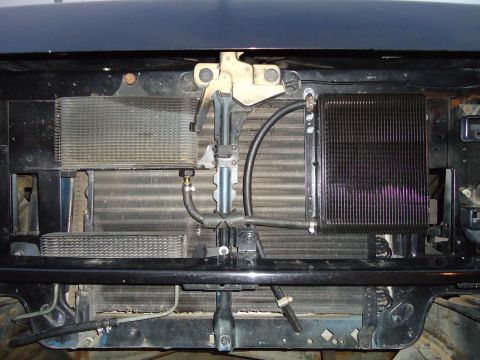 1987 Ford F-150 - Front view of a 1987 Ford F-150, showing the radiator and cooling system components.