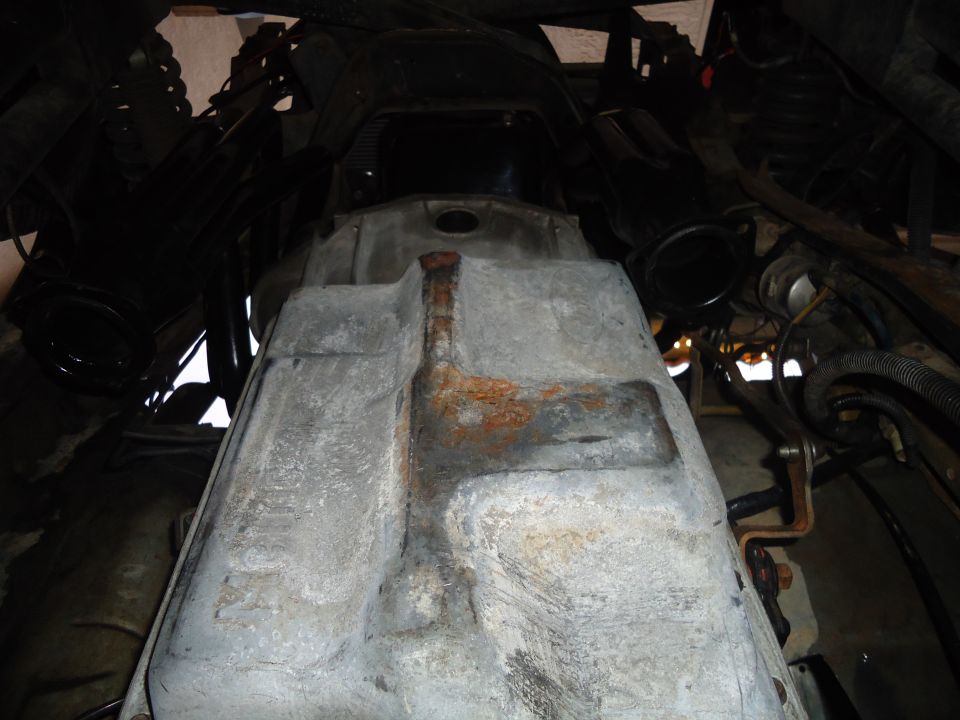 underbody fuel tank, possibly from a truck