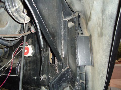 1987 Ford F-150 - Detail shot of engine bay components, including wiring harnesses and structural brackets.