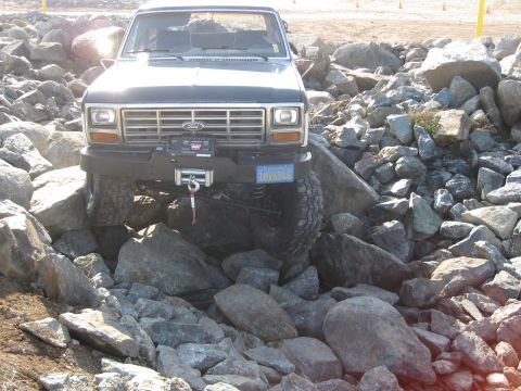 1986 Ford Bronco - 1986 Ford Bronco tackling a challenging rock crawling course.
