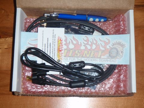 1996 Ford Bronco - A box contains electronic parts and cables, along with a blue pen and a thank you card from Moates.net.