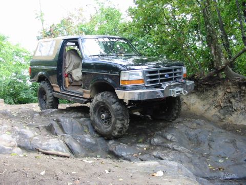 1994 Ford Bronco - Coming down Guard Rail