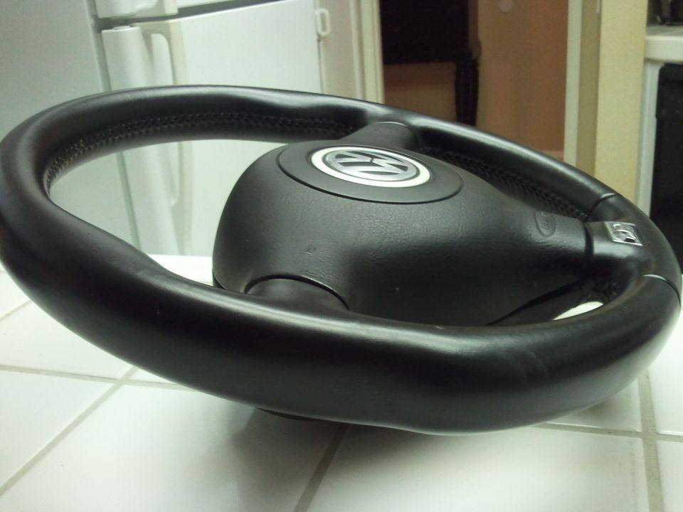 Volkswagen steering wheel with logo on the hub