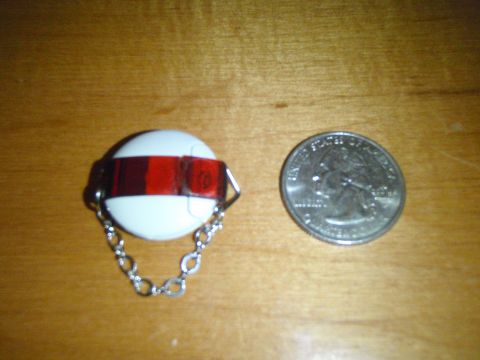 1996 Ford Bronco - A keychain fob with a red stripe is shown next to a U.S. quarter for scale.