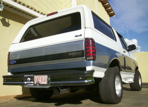 1993 Ford Bronco - 5" diameter Chromed Exhaust Tip runing straight back below the right side of the rear bumper