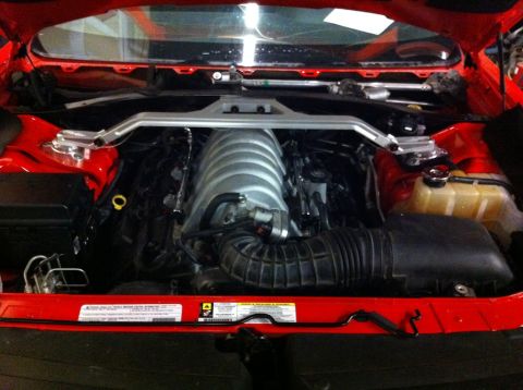 2010 Dodge Challenger - Engine bay of a 2010 Dodge Challenger, a Hemi engine and strut tower brace.