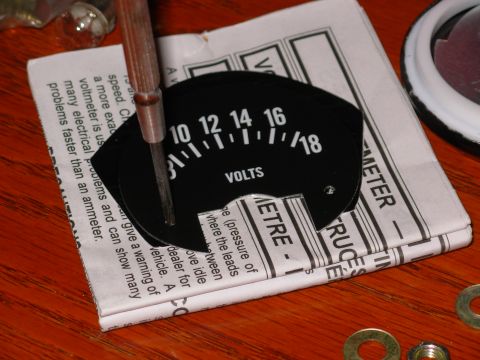 1975 Ford Bronco - Using the original face as a guide, I used the screwdriver to punch screw holes in the MarsChariot face. I even found a use for the instruc…