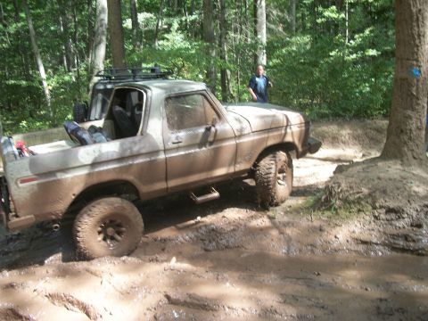 1979 Ford Bronco - This 1978 Ford Bronco is navigating a challenging muddy off-road course.