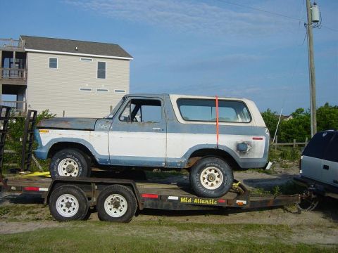 1979 Ford Bronco - This 1979 Ford Bronco, seen on a trailer, appears to be in a state of disrepair.