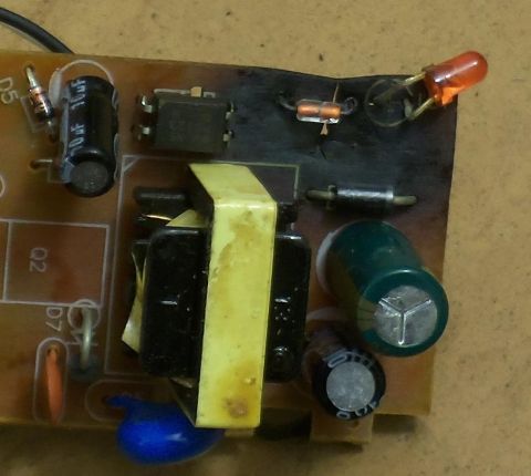 2000 Mercury Grand Marquis - Electronic circuit board with transformer, LED, and capacitors visible.