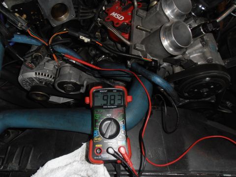1990 Ford Bronco - Multimeter reading .983 volts in an engine bay with an MSD ignition component.