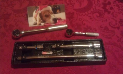 1965 Ford Mustang - A KS Tools socket set and ratchets are displayed with a holiday photo of a dog.