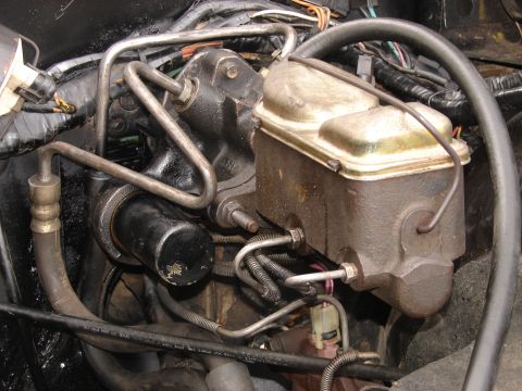1973 Ford Ranchero - Close-up view of a brake master cylinder and associated plumbing.