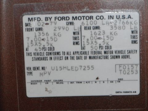 1979 Ford Bronco - A vehicle identification label shows manufacturing details including date and VIN.