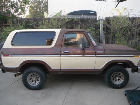 1979 Ford Bronco - This 1979 Ford Bronco is shown in a side profile, a two-tone brown and cream paint scheme.