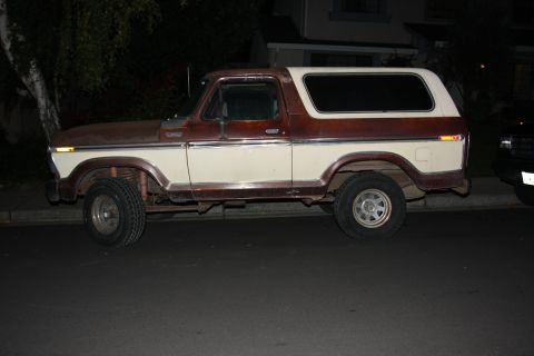 1979 Ford Bronco - A side view of a two-tone brown and white Ford Bronco shows its condition and body style.