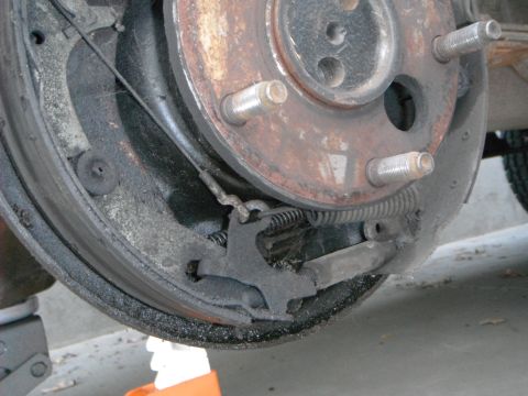 1979 Ford Bronco - This photo shows a close-up view of a vehicle's drum brake assembly, including the brake shoes and springs.