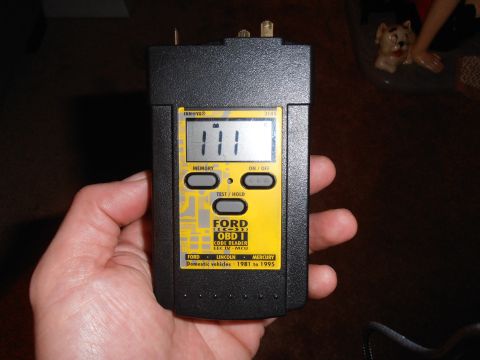 1990 Ford Bronco - A Ford OBD I code reader, compatible with domestic vehicles from 1981 to 1995, is shown in a hand.