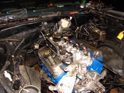 1973 Ford Ranchero - Close-up view of a vehicle's engine bay, showing engine components and wiring.