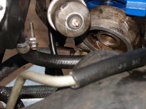 1973 Ford Ranchero - This image shows a close-up view of an engine's oil filter housing and associated plumbing.